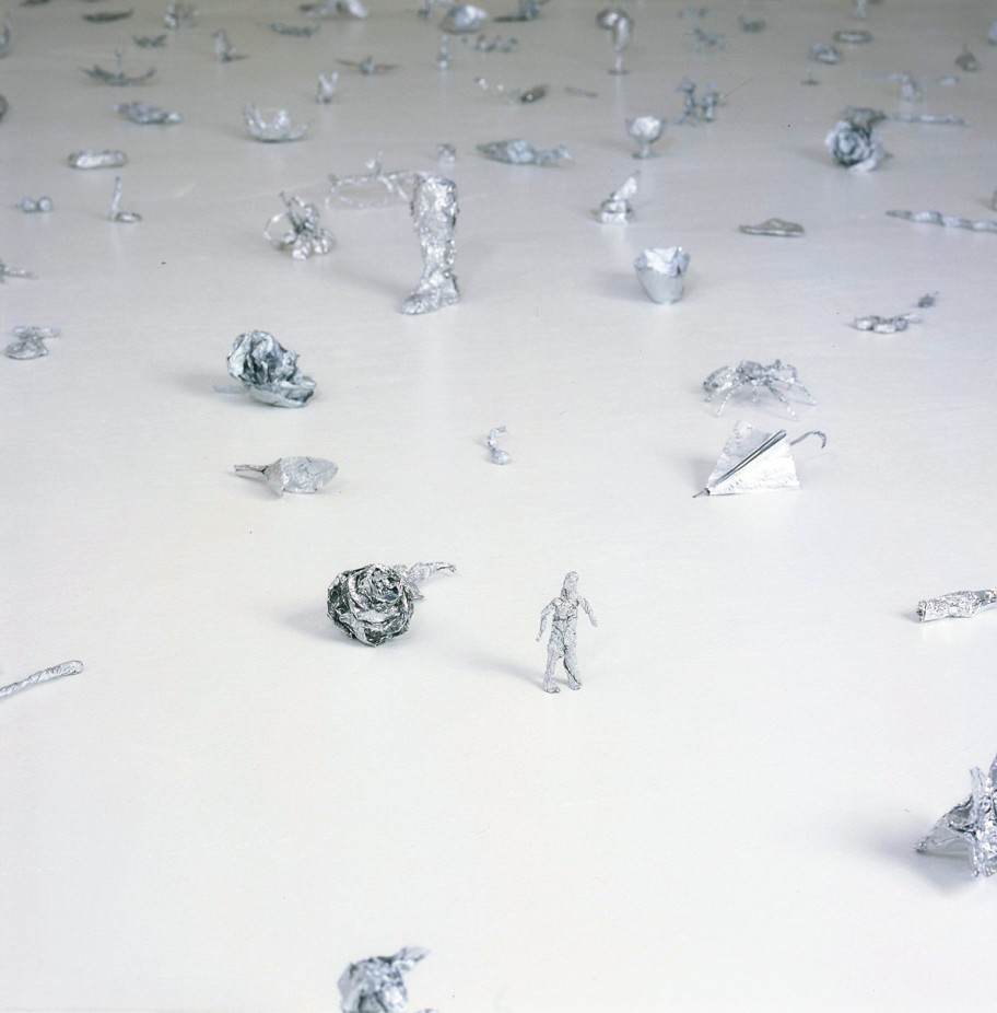 Roman Ondak Passage (Detail), 2004 Installation, Table, Silver foil sculptures 350 x 600 x 90 cm 